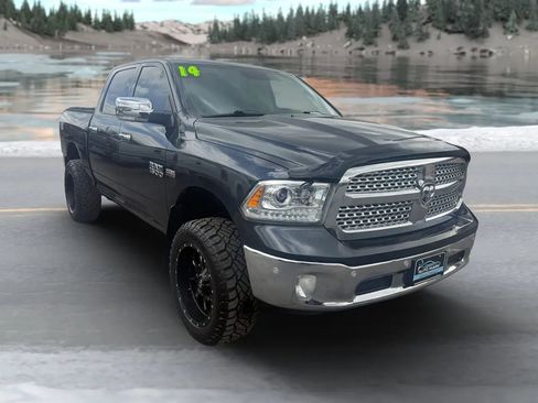 Used 2014 RAM 1500 Laramie w/ Convenience Group AWD/4WD image 1