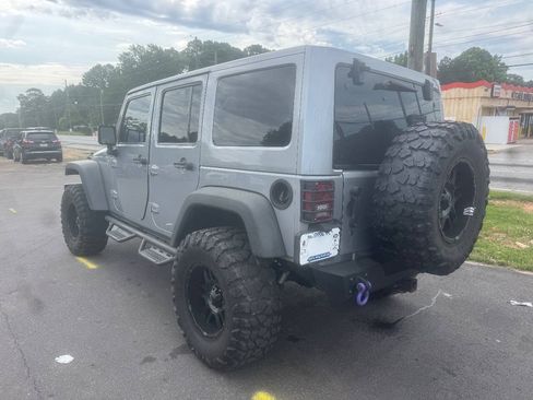 Used 2014 Jeep Wrangler Unlimited Rubicon w/ Dual Top Group AWD/4WD image 4