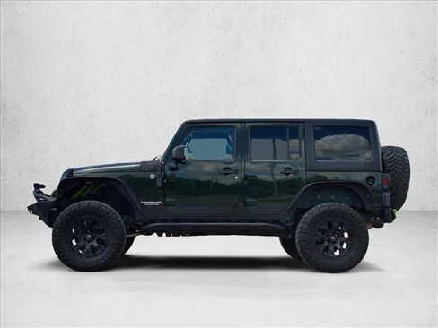 Used 2011 Jeep Wrangler Unlimited Sahara w/ Trailer Tow Group AWD/4WD image 9