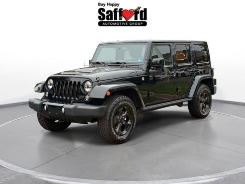 Used 2015 Jeep Wrangler Unlimited Sahara AWD/4WD image 1