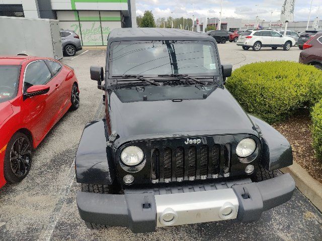 Used 2014 Jeep Wrangler Unlimited Sahara w/ Dual Top Group AWD/4WD image 21
