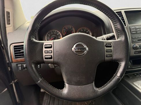 Used 2011 Nissan Armada Platinum w/ 2nd Row Captain Seat Pkg image 9