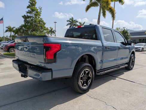 Certified 2023 Ford F150 Lightning XLT w/ Tow Technology Package AWD/4WD image 4