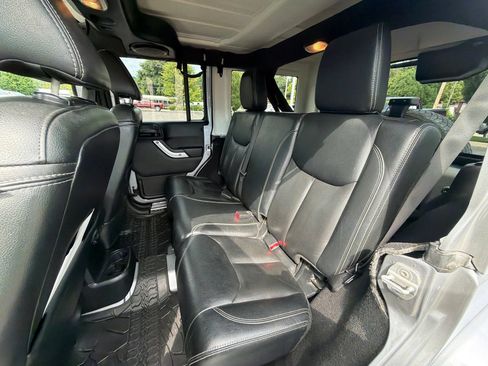 Used 2013 Jeep Wrangler Unlimited Sahara w/ Dual Top Group AWD/4WD image 21