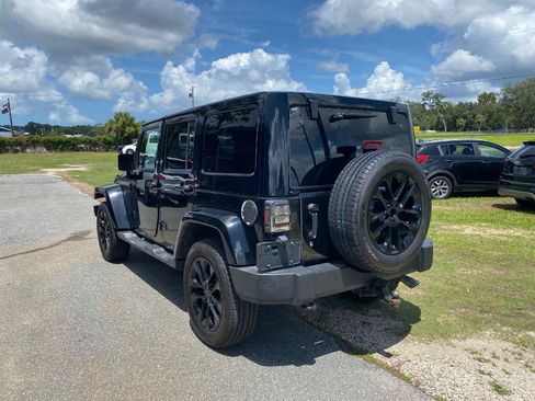 Used 2012 Jeep Wrangler Unlimited Sahara w/ Dual Top Group AWD/4WD image 10