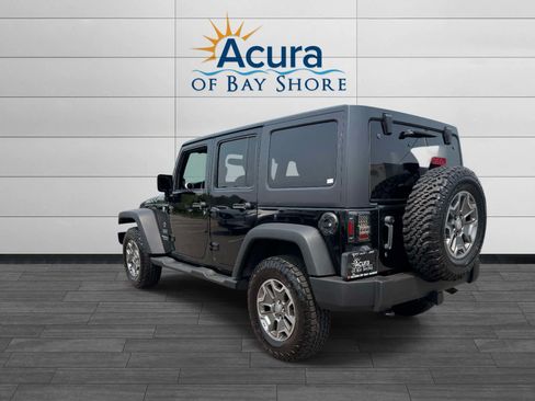 Used 2013 Jeep Wrangler Unlimited Rubicon w/ Dual Top Group AWD/4WD image 5