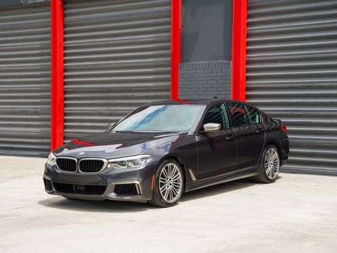 Used 2020 BMW M550i xDrive w/ Executive Package AWD/4WD image 1