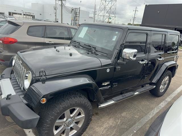 Used 2012 Jeep Wrangler Unlimited Sahara w/ Dual Top Group AWD/4WD image 3