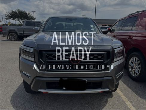 Used 2024 Nissan Frontier PRO-4X AWD/4WD image 1