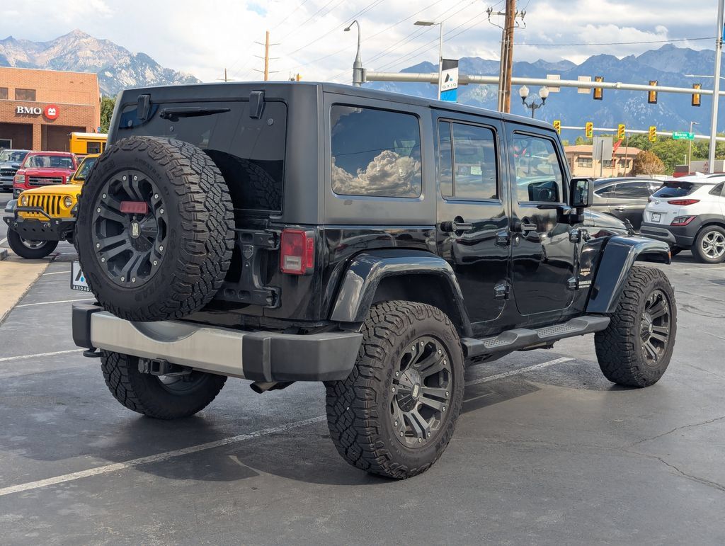 Used 2013 Jeep Wrangler Unlimited Sahara w/ Max Tow Pkg AWD/4WD image 4
