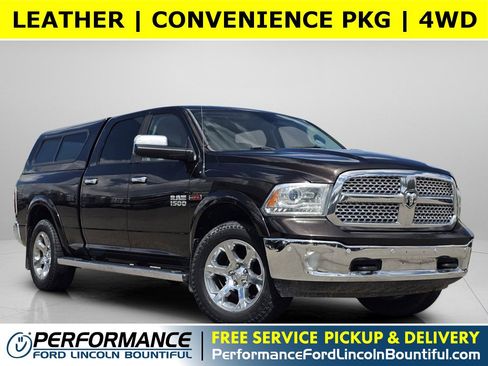 Used 2016 RAM 1500 Laramie AWD/4WD image 1
