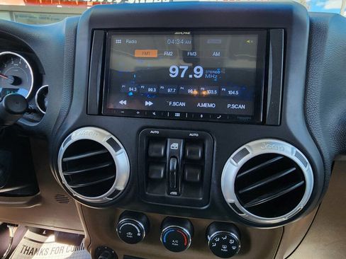 Used 2012 Jeep Wrangler Unlimited Sahara w/ Trailer Tow Group AWD/4WD image 13