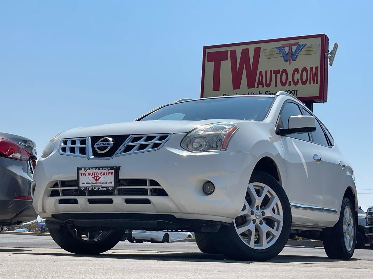 Used 2013 Nissan Rogue SL AWD/4WD image 1