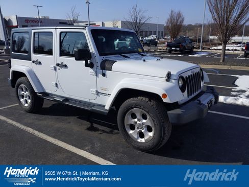 Used 2014 Jeep Wrangler Unlimited Sahara w/ Connectivity Group image 1