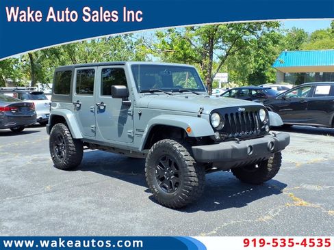 Used 2014 Jeep Wrangler Unlimited Sport w/ Quick Order Package 23S AWD/4WD image 1