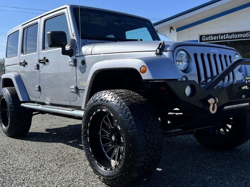 Used 2015 Jeep Wrangler Unlimited Sahara w/ Dual Top Group image 1