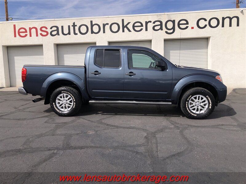 Used 2014 Nissan Frontier SV AWD/4WD image 1