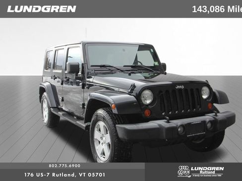 Used 2007 Jeep Wrangler Unlimited Sahara w/ Dual Top Group image 1