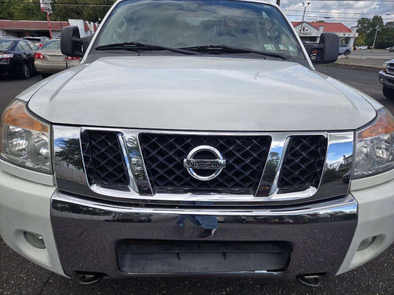 Used 2012 Nissan Titan SV w/ SV Premium Utility Pkg AWD/4WD image 3