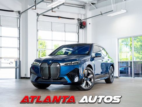Used 2024 BMW iX xDrive50 w/ Premium Package AWD/4WD image 1