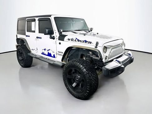 Used 2015 Jeep Wrangler Unlimited Sport image 1