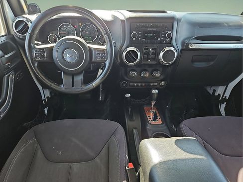 Used 2013 Jeep Wrangler Unlimited Sahara w/ Dual Top Group AWD/4WD image 13