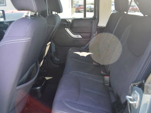 Used 2014 Jeep Wrangler Unlimited Rubicon w/ Dual Top Group AWD/4WD image 19