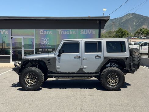 Used 2016 Jeep Wrangler Unlimited Sahara AWD/4WD image 1