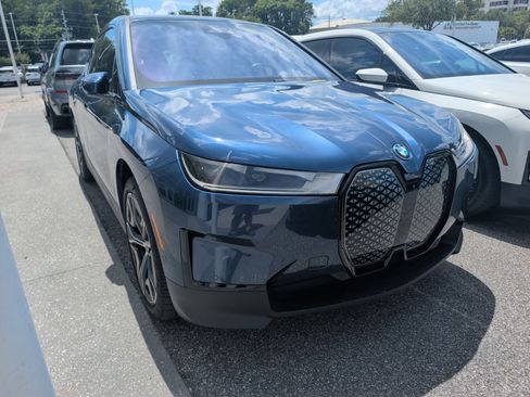 Used 2024 BMW iX xDrive50 w/ Luxury Package AWD/4WD image 1