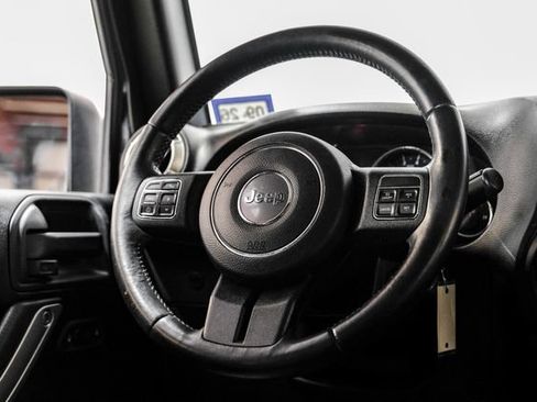 Used 2016 Jeep Wrangler Unlimited Sahara w/ Dual Top Group AWD/4WD image 25