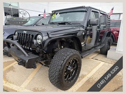 Used 2012 Jeep Wrangler Unlimited Sahara AWD/4WD image 1