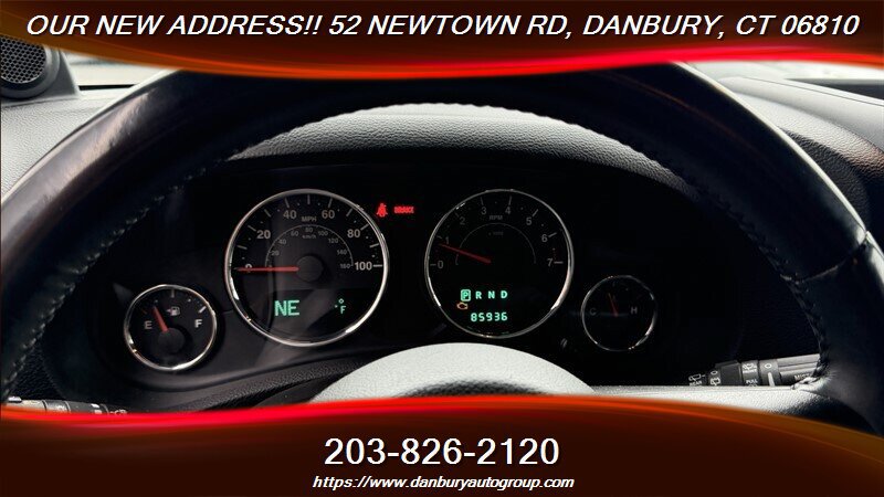 Used 2014 Jeep Wrangler Unlimited Sahara w/ Dual Top Group AWD/4WD image 14