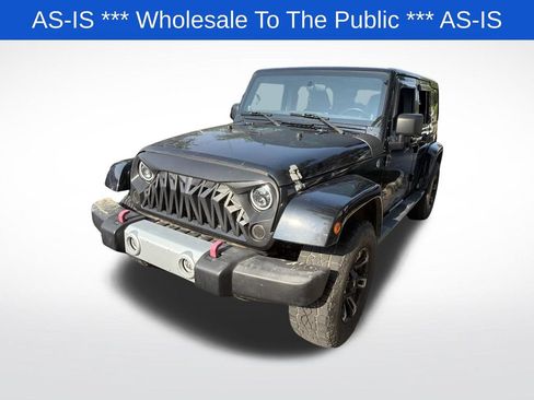 Used 2012 Jeep Wrangler Unlimited Sahara w/ Dual Top Group AWD/4WD image 3