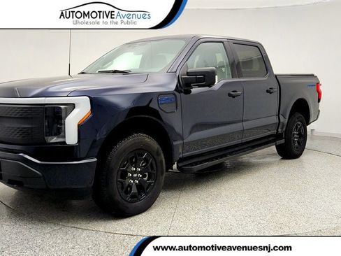 Used 2025 Ford F150 Lightning XLT image 1