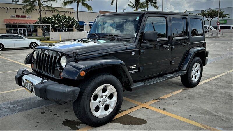 Used 2013 Jeep Wrangler Unlimited Sahara AWD/4WD image 1