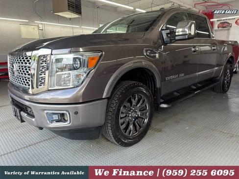 Used 2016 Nissan Titan Platinum Reserve AWD/4WD image 1