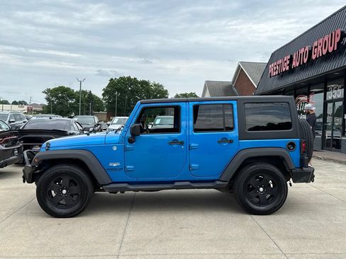 Used 2015 Jeep Wrangler Unlimited Sahara w/ Max Tow Package AWD/4WD image 3