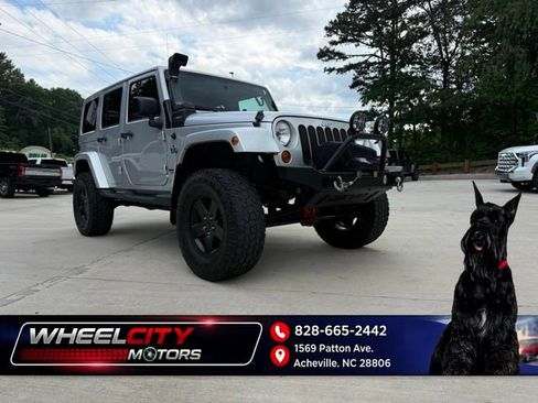Used 2012 Jeep Wrangler Unlimited Sahara AWD/4WD image 1