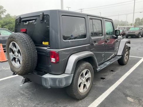 Used 2016 Jeep Wrangler Unlimited Sahara w/ Dual Top Group AWD/4WD image 4