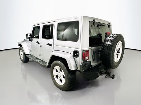Used 2014 Jeep Wrangler Unlimited Sahara w/ Dual Top Group AWD/4WD image 6
