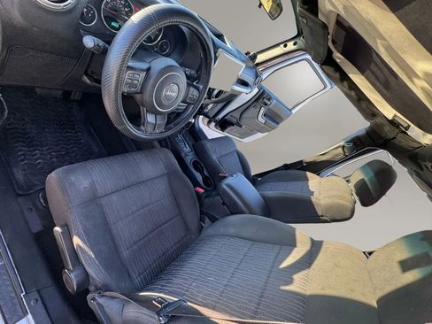 Used 2012 Jeep Wrangler Unlimited Sahara w/ Dual Top Group AWD/4WD image 11
