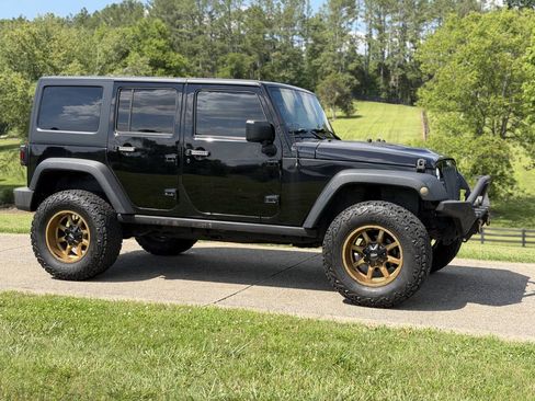 Used 2014 Jeep Wrangler Unlimited Rubicon w/ Dual Top Group AWD/4WD image 7