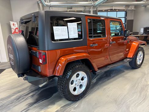 Used 2014 Jeep Wrangler Unlimited Sahara w/ Dual Top Group AWD/4WD image 27