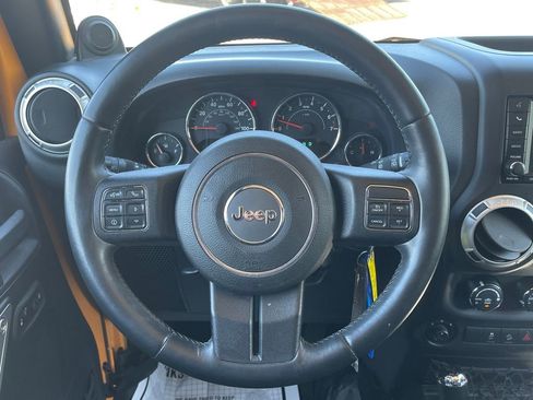 Used 2013 Jeep Wrangler Unlimited Sahara w/ Dual Top Group AWD/4WD image 22