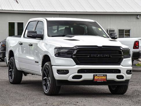 Used 2024 RAM 1500 Laramie AWD/4WD image 1