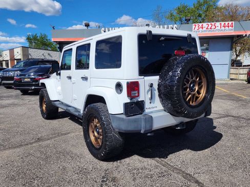 Used 2012 Jeep Wrangler Unlimited Sahara w/ Trailer Tow Group AWD/4WD image 10