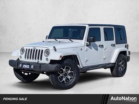 Used 2016 Jeep Wrangler Unlimited Sahara w/ Dual Top Group image 1