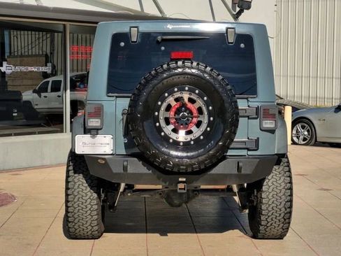 Used 2014 Jeep Wrangler Unlimited Rubicon w/ Dual Top Group AWD/4WD image 5