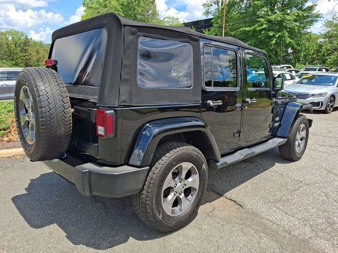 Used 2016 Jeep Wrangler Unlimited Sahara w/ Dual Top Group AWD/4WD image 6