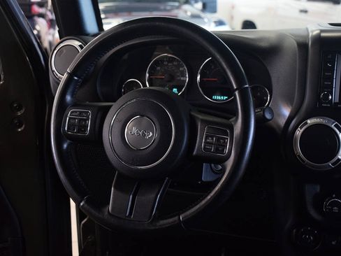 Used 2015 Jeep Wrangler Unlimited Sahara w/ Dual Top Group AWD/4WD image 46